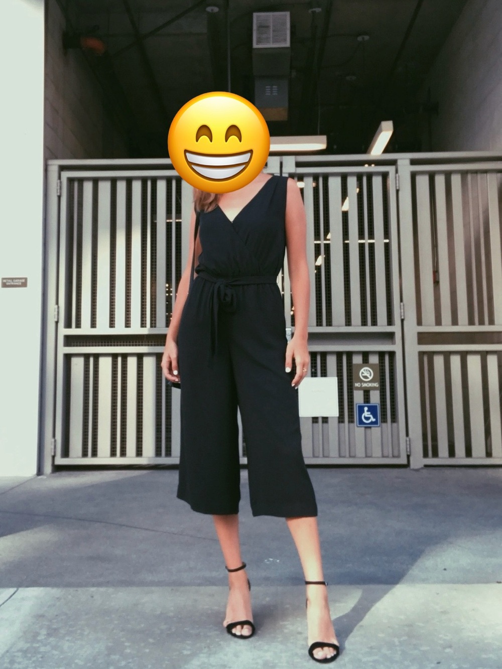 Babaton Black Sleeveless V-Neck Jumpsuit with Tie Waist